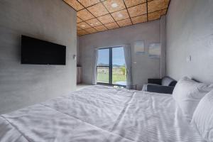 Postel nebo postele na pokoji v ubytování Sun Island