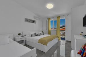 Posteľ alebo postele v izbe v ubytovaní Ana Apartment