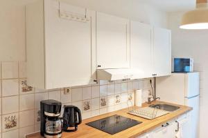 Cucina o angolo cottura di Chic Apartment with Parking place