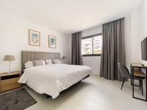 Posteľ alebo postele v izbe v ubytovaní Higueron West 511 + 30 fotografií