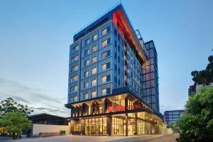 a rendering of a hotel building with windows at ibis Palembang Sanggar in Palembang