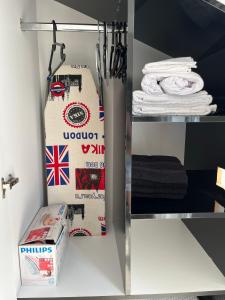 a walk in closet with a box of towels at Jadran Studio in Budva