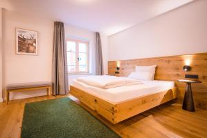 Postel nebo postele na pokoji v ubytování Brauereigasthof-Jakob