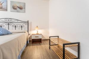 Postel nebo postele na pokoji v ubytování Appartamento Potenza 50 mt mare - Apulia Home