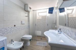 Koupelna v ubytování Appartamento Potenza 50 mt mare - Apulia Home