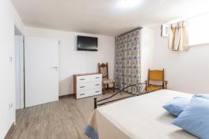 Postel nebo postele na pokoji v ubytování Appartamento Potenza 50 mt mare - Apulia Home