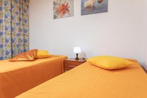 Postel nebo postele na pokoji v ubytování Appartamento Potenza 50 mt mare - Apulia Home