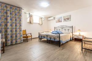 Postel nebo postele na pokoji v ubytování Appartamento Potenza 50 mt mare - Apulia Home