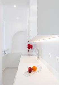 Cama ou camas em um quarto em Aeri Villas & Apartments