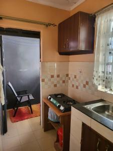 Ett kök eller pentry på G&G Homes Naka Nakuru