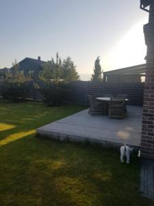 Zahrada ubytování Three bedroom house with garden by Klaipeda + 1 fotografie