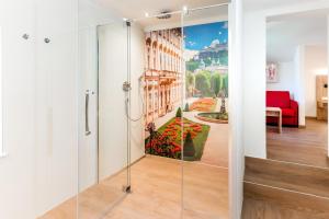 Voodi või voodid majutusasutuse Hotel Rosenvilla toas