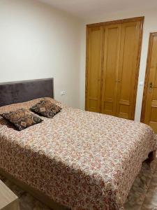 Łóżko lub łóżka w pokoju w obiekcie Уютная квартира в Calpe