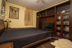 En eller flere senge i et værelse på 299 - Teljes panorámás közvetlen balatonparti exkluzív apartman