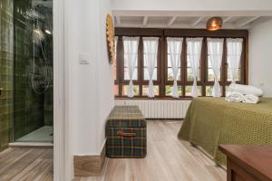 Postel nebo postele na pokoji v ubytování CASA GERRA COMILLAS