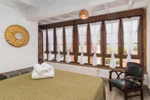 Postel nebo postele na pokoji v ubytování CASA GERRA COMILLAS