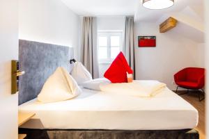 Voodi või voodid majutusasutuse Hotel Rosenvilla toas