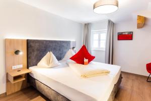 Voodi või voodid majutusasutuse Hotel Rosenvilla toas
