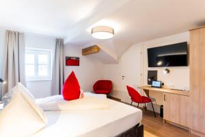 Voodi või voodid majutusasutuse Hotel Rosenvilla toas