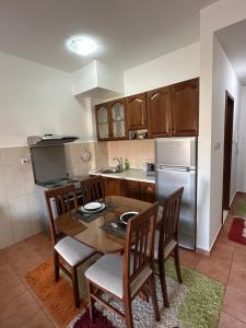 Kjøkken eller kjøkkenkrok på Bella Apartman