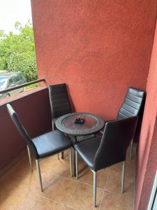 En balkong eller terrasse på Bella Apartman