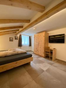 Postel nebo postele na pokoji v ubytování apart lobenwein