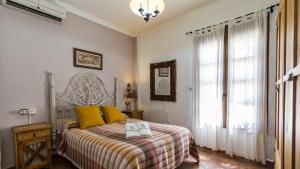 Ένα ή περισσότερα κρεβάτια σε δωμάτιο στο Villa Rey Ardales by Ruralidays +35 φωτογραφίες