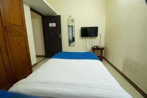 TV a/nebo společenská místnost v ubytování High Point Serviced Apartment