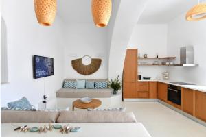 Η κουζίνα ή μικρή κουζίνα στο Rina Houses +6 φωτογραφίες