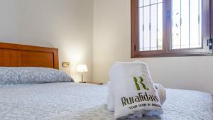 Postel nebo postele na pokoji v ubytování La Villa Pozuelas Iznájar by Ruralidays