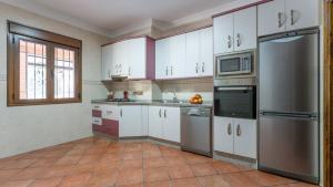 Kuchyň nebo kuchyňský kout v ubytování La Villa Pozuelas Iznájar by Ruralidays