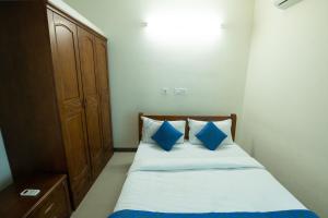 Postel nebo postele na pokoji v ubytování High Point Serviced Apartment