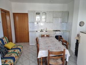 Kuchyň nebo kuchyňský kout v ubytování Apartments HARMONY Novalja