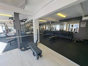 an overhead view of a gym with treadmills and chairs at Kramfors Stadshotell AB in Kramfors