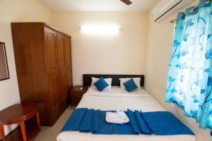 Postel nebo postele na pokoji v ubytování High Point Serviced Apartment