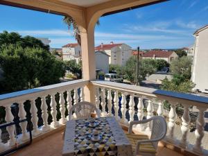 Balkón nebo terasa v ubytování Apartments HARMONY Novalja