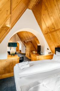 a bedroom with two beds in a attic at Hotel Riesengebirge in Neuhof an der Zenn
