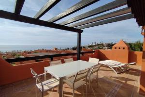 Balkon lub taras w obiekcie Jardines de Nueva Galera
