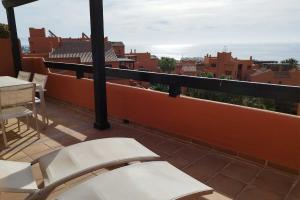 Balkon lub taras w obiekcie Jardines de Nueva Galera