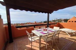 Balkon lub taras w obiekcie Jardines de Nueva Galera