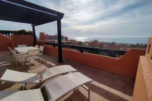 Balkon lub taras w obiekcie Jardines de Nueva Galera