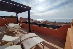 Balkon lub taras w obiekcie Jardines de Nueva Galera