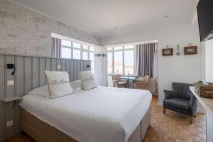 Postel nebo postele na pokoji v ubytování West Bay + 37 fotografií