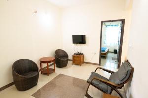 TV a/nebo společenská místnost v ubytování High Point Serviced Apartment