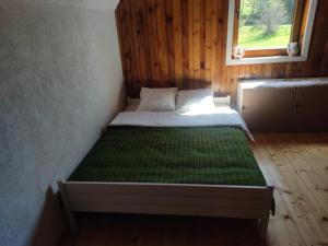 Letto o letti in una camera di Vukov Konak - Wolf's lodge