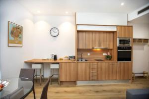 Kuchyň nebo kuchyňský kout v ubytování Apartament al cor del barri vell de Girona