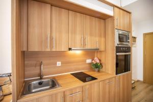 Kuchyň nebo kuchyňský kout v ubytování Apartament al cor del barri vell de Girona