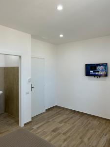 TV a/nebo společenská místnost v ubytování Stella di Mare- Cruise Shuttle