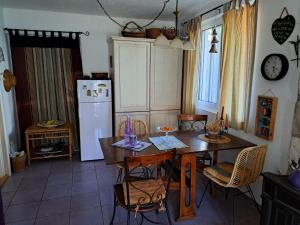 Kuchyň nebo kuchyňský kout v ubytování Apartman Mafini