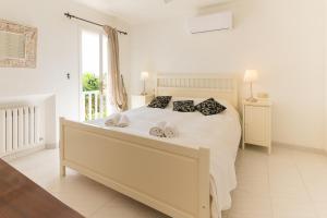 Ένα ή περισσότερα κρεβάτια σε δωμάτιο στο Villa Cristina +34 φωτογραφίες